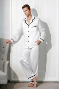 Full-length view of a man wearing the white MANITO Noir Ruban Men's Silk Pajama Set.