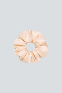 Donuts Large Silk Scrunchie in champagne with plush gathers for a cushioned, low-friction hold.