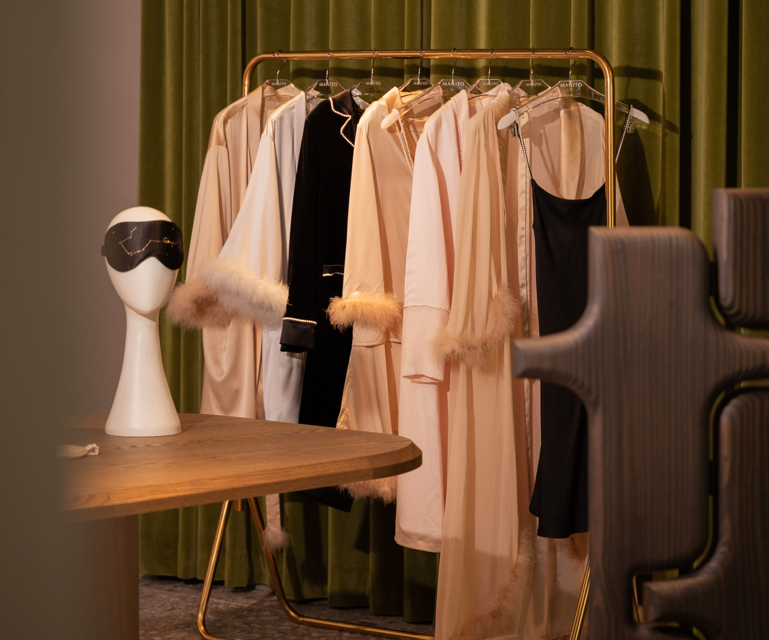 MANITO's collaboration with H.N.LIN Art Space, showcasing a sophisticated silk apparel collection in an artful and serene space, where guests experience the language of silk woven into winter's secrets.