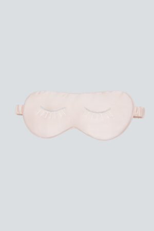Pink MANITO Pearlwear Silk Eye Mask with delicate crystal eyelash embroidery, designed for gentle eye comfort.