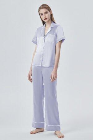 Studio shot of full lilac MANITO Authentic Short Sleeve Pajama Set with wide-leg pants and contrast piping.