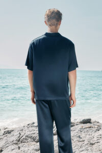 Back view of the MANITO Remington Men's Short Sleeve Pajama Set in navy, showing relaxed fit and smooth silk texture.