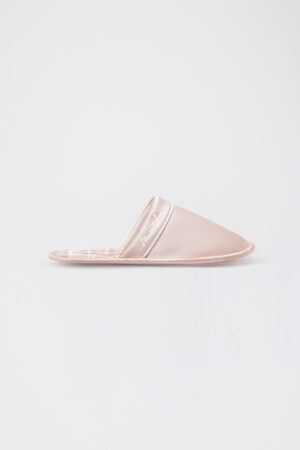 Side view of pink Authentic Women's Silk Lounge Shoes, showing sleek mule silhouette with quilted footbed.