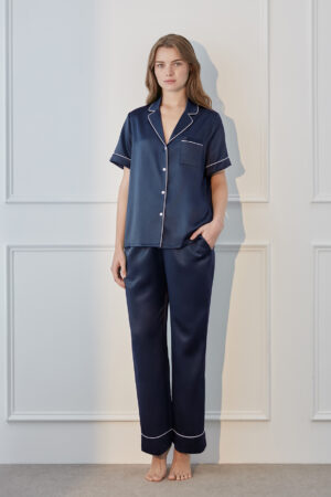 Front view of navy MANITO Authentic Short Sleeve Pajama Set with white piping and classic tailored design.