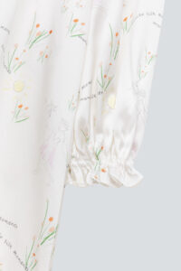 Detail of ruffle trim and stylish lantern sleeves on the Princess Louise Silk Nightgown.