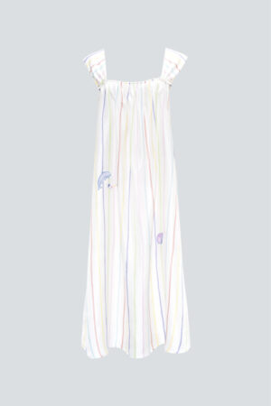 MANITO rainbow stripe dress laid flat, displaying its flowy silhouette, cheerful stripes, and whimsical embroidery.