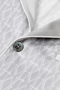 Close-up view of Classic Monogram Men's Silk Pajama with Button Detail.