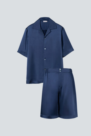 Flat lay of blue MANITO Sketchy Men's Short Pajama Set with buttoned waistband.