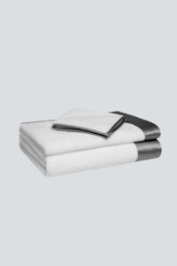 MANITO Brimmy 3 Piece Bath Towel Set with dark-gray silk trim, crafted from soft absorbent cotton terry.