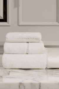 Aqua 3 Pieces Bath Towel Set neatly stacked, showcasing MANITO hollow lace logo and refined silk edging.