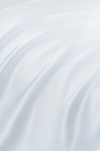 Close-up of MANITO Authentic Silk Pillowcase Set fabric texture, emphasizing the natural sheen and softness.
