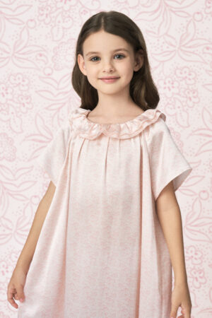 Child modeling BONPOINT×MANITO Celestial Kid's  Nightdress with soft pink silk fabric and elegant ruffle collar.
