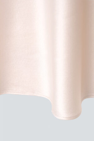 Close-up of the soft hem of MANITO basal round-neck silk nightdress.