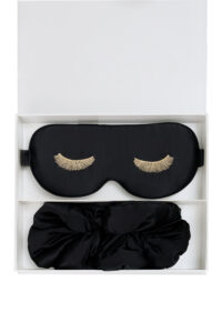 Bestie Gift Box featuring black silk eye mask and matching scrunchy arranged inside the gift box.