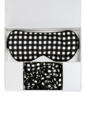 Black gingham silk sleep mask and scrunchie set neatly arranged inside the Blooming Gift Box.