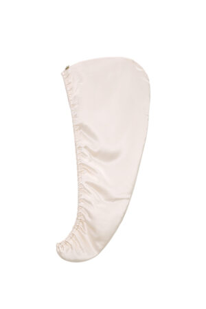 Blooming Silk Hair Turban displayed side view to highlight its smooth ballet-pink mulberry silk finish.