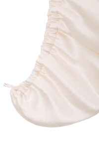 Blooming Silk Hair Turban close-up showing the elasticized end for a secure, comfortable fit.