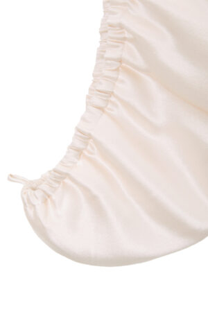 Blooming Silk Hair Turban close-up showing the elasticized end for a secure, comfortable fit.