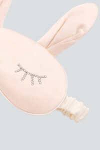 Close-up of Bunny Child Eye Mask showing silk rabbit ear shape and crystal eyelash pattern.