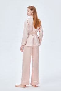 Back view of MANITO Elite Women's Silk Robe Suit in pink, highlighting relaxed fit and smooth silk texture.