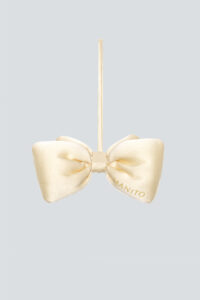 Solo display of Yellow Calla Silk Scented Sachet bow against a light blue background.