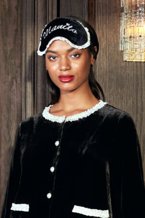 MANITO Charlotte Luxury Silk Eye Mask for Sleeping worn by woman.