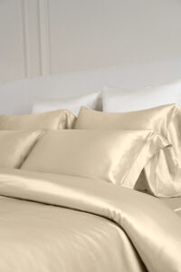MANITO Classic Soft Light Bedding Set in champagne, displayed in a modern bedroom setting with coordinated decor.