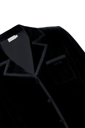 Black Combo Women's Velvet Pajama Set top details, showing the rich velvet surface and smooth satin-trimmed collar and pocket.