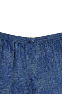 Detail of Cube Men's Shorts, showcasing elastic design and refined dot-line texture in navy silk.