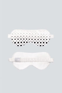 Overview of MANITO Cubes Silk Eye Mask, the top showing the patterned front and the bottom showing the plain white back.