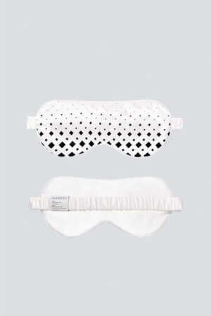 Overview of MANITO Cubes Silk Eye Mask, the top showing the patterned front and the bottom showing the plain white back.