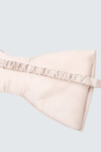 Back view of Duchess Pink Bow Silk Cute Eye Mask with a soft, ruffled elastic band for a comfortable fit.