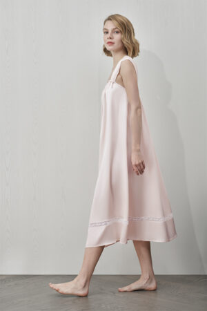 Side view of MANITO Duchess Tank Silk Maxi Dress in pink, flowing silhouette with wide straps.