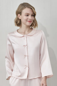 MANITO Duchess Women's Silk Pajama Set close-up of top with bow detailing and round collar.