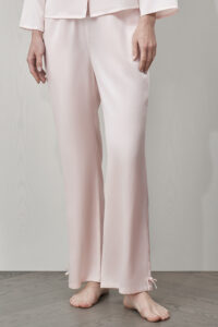 MANITO Duchess Women's Silk Pajama Set pants with bow details at ankles, soft blush pink.