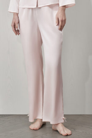 MANITO Duchess Women's Silk Pajama Set pants with bow details at ankles, soft blush pink.