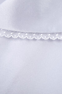 Close-up of the collar with white lace trim from MANITO Effie Women's Pajama Set.