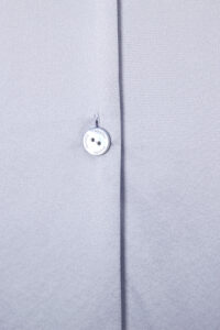 Close-up of the button on MANITO Effie Women's Pajama Set, showcasing the elegant design of this white lace pajama set.