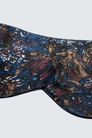 Close-up of Euphoria Men Silk Eye Mask's luxurious French floral print, showcasing the intricate design in blue.