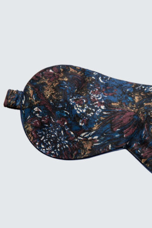 Detailed shot of Euphoria Silk Eye Mask for Men featuring a vibrant French floral design in blue.