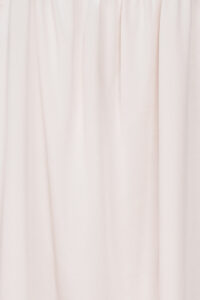 Texture close-up of the silk fabric on MANITO Fairy Kid's Tank Nightdress in blush pink.