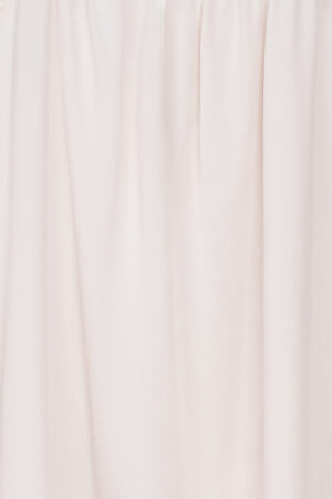 Texture close-up of the silk fabric on MANITO Fairy Kid's Tank Nightdress in blush pink.