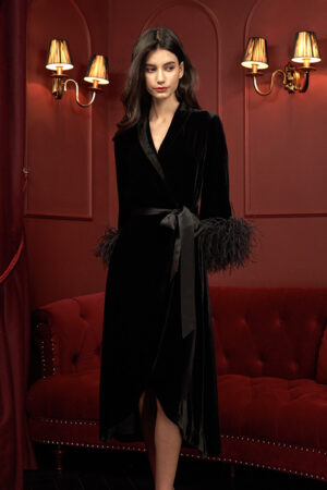 Sophisticated Fiesta long black robe with feathers for holiday, tied with a satin belt.