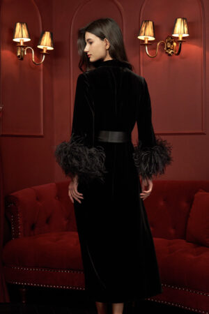 Back view of Fiesta long black robe with feathers for holiday, highlighting its timeless elegance.