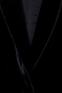 Close-up of soft velvet material from Fiesta black holiday pajama top.