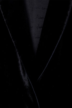 Close-up of soft velvet material from Fiesta black holiday pajama top.