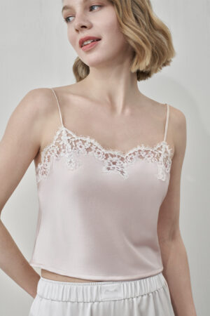 Side view of MANITO Flora Lace Silk Camisole Top in blush pink, highlighting lace trim and smooth silk finish.