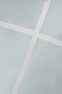 MANITO Fluora Silk Bedding Set with soft sheen and color contrast, showing smooth texture and luxury finish.