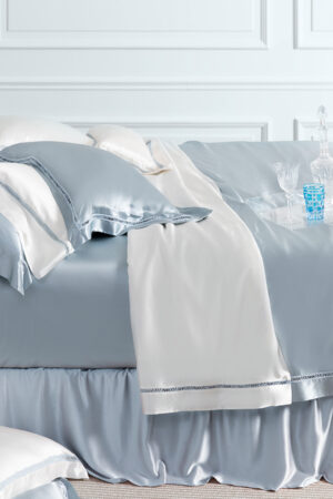 Aqua 4-Piece Bedding Set featuring smooth silk sheets, pillowcases, and duvet cover in tranquil aqua tones by MANITO.