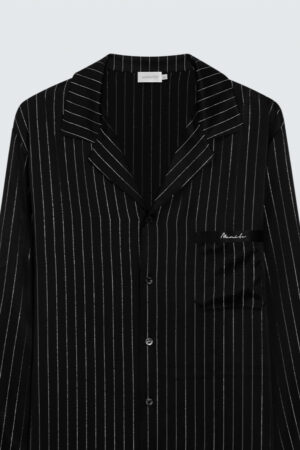 Flat lay of MANITO Galaxy men's pajama shirt in black with white pinstripes.